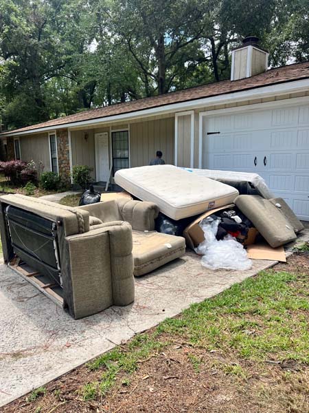 Picture of a residential rental property with junk left behind