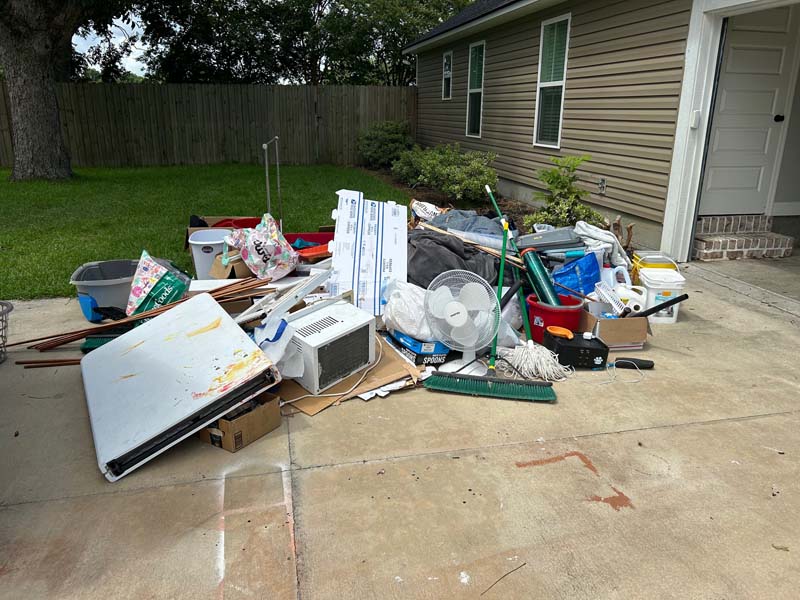 Picture of a residential rental property with junk left behind